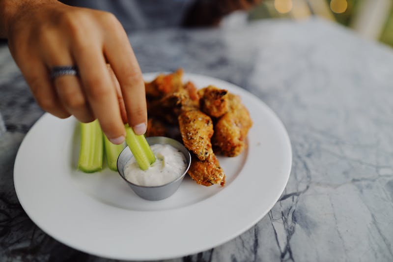 Seasoned wings with dipping sauce